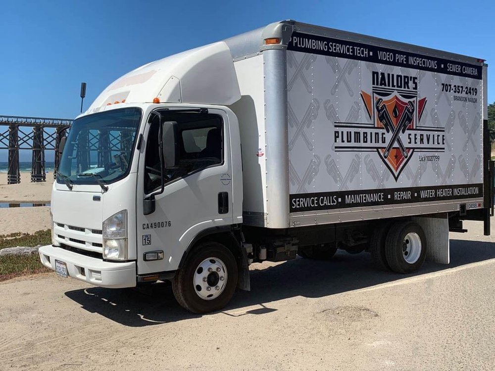 Nailor's Plumbing Service truck on the Fort Bragg coast